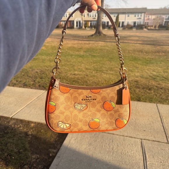 Coach Handbags - Coach Citrus Print Mini Shoulder Bag in Orange and Tan